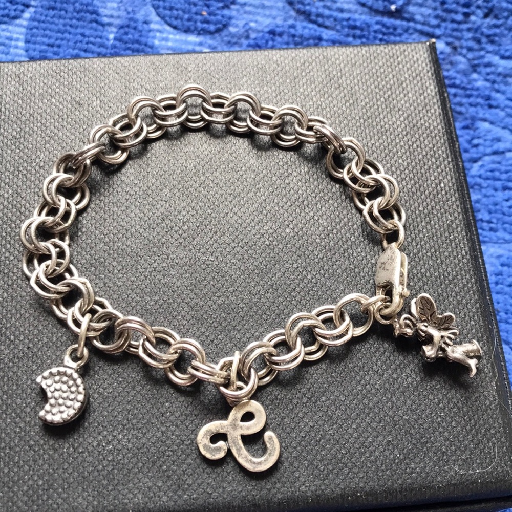 .925 sterling silver charms bracelet 15.65gm 7 3/8